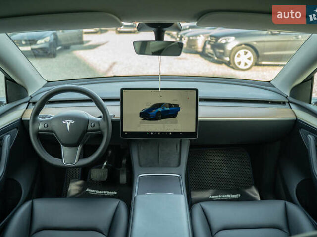 Синий Тесла Model Y, объемом двигателя 0 л и пробегом 79 тыс. км за 31900 $, фото 15 на Automoto.ua