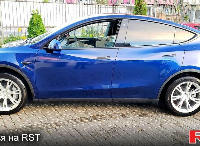 Синий Тесла Model Y, объемом двигателя 0.39 л и пробегом 1000 тыс. км за 32000 $, фото 1 на Automoto.ua