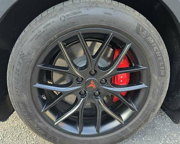 Синий Тесла Model Y, объемом двигателя 0 л и пробегом 51 тыс. км за 26400 $, фото 6 на Automoto.ua