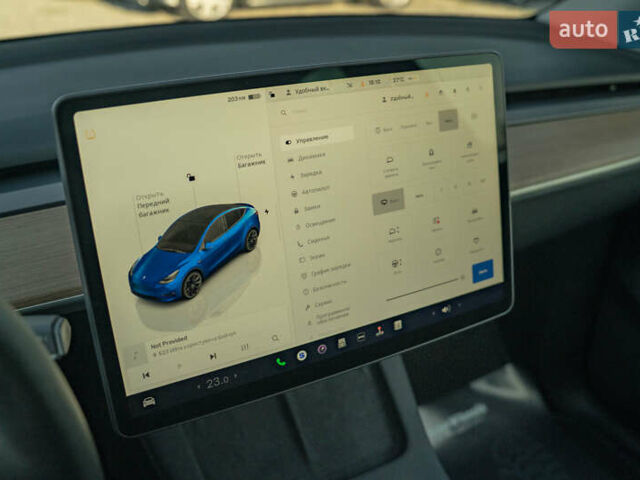 Синий Тесла Model Y, объемом двигателя 0 л и пробегом 79 тыс. км за 31900 $, фото 20 на Automoto.ua