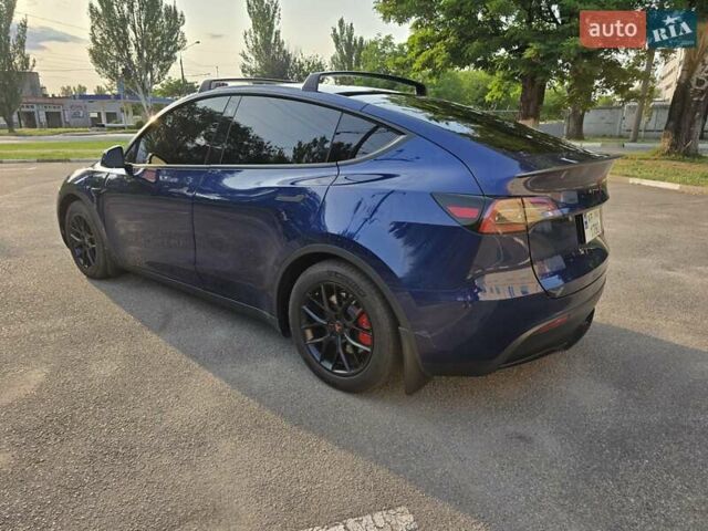 Синий Тесла Model Y, объемом двигателя 0 л и пробегом 51 тыс. км за 26400 $, фото 2 на Automoto.ua
