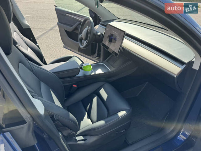 Синий Тесла Model Y, объемом двигателя 0 л и пробегом 17 тыс. км за 32500 $, фото 23 на Automoto.ua