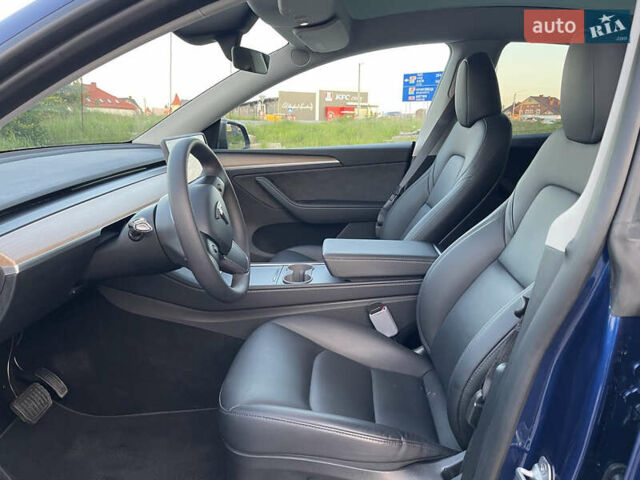 Синий Тесла Model Y, объемом двигателя 0 л и пробегом 15 тыс. км за 28200 $, фото 27 на Automoto.ua