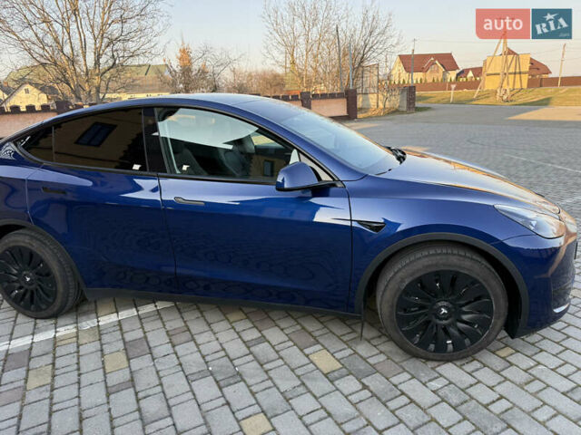 Синий Тесла Model Y, объемом двигателя 0 л и пробегом 27 тыс. км за 28100 $, фото 36 на Automoto.ua