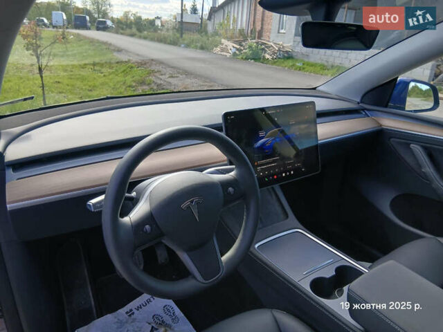 Синий Тесла Model Y, объемом двигателя 0 л и пробегом 25 тыс. км за 27300 $, фото 5 на Automoto.ua