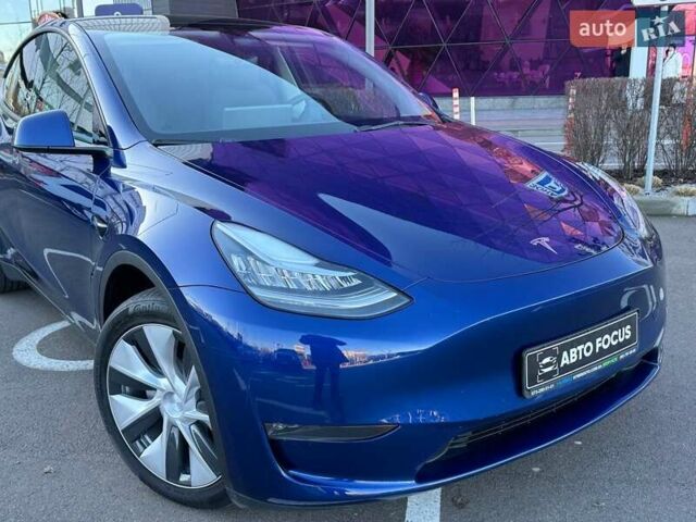 Синий Тесла Model Y, объемом двигателя 0 л и пробегом 48 тыс. км за 32990 $, фото 1 на Automoto.ua