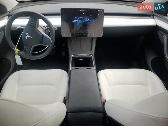 Синий Тесла Model Y, объемом двигателя 0 л и пробегом 78 тыс. км за 10100 $, фото 7 на Automoto.ua