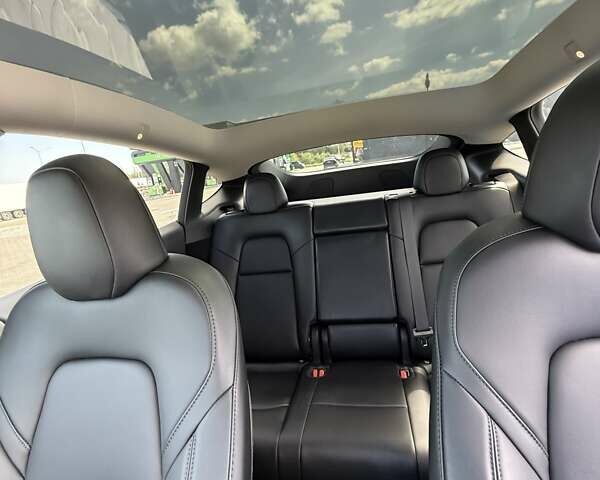 Синий Тесла Model Y, объемом двигателя 0 л и пробегом 13 тыс. км за 28500 $, фото 10 на Automoto.ua