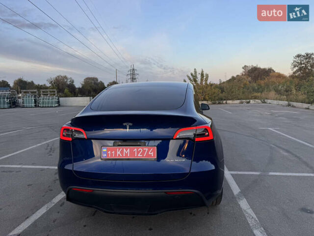 Синий Тесла Model Y, объемом двигателя 0 л и пробегом 60 тыс. км за 26900 $, фото 5 на Automoto.ua