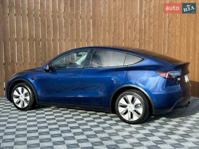 Синий Тесла Model Y, объемом двигателя 0 л и пробегом 22 тыс. км за 26000 $, фото 2 на Automoto.ua