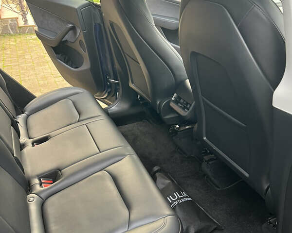 Синий Тесла Model Y, объемом двигателя 0 л и пробегом 32 тыс. км за 32800 $, фото 15 на Automoto.ua