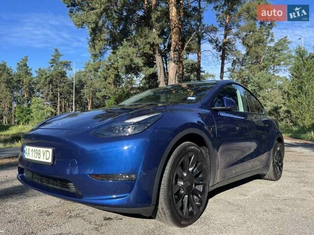 Синий Тесла Model Y, объемом двигателя 0 л и пробегом 30 тыс. км за 29000 $, фото 2 на Automoto.ua