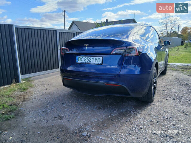 Синий Тесла Model Y, объемом двигателя 0 л и пробегом 25 тыс. км за 27300 $, фото 12 на Automoto.ua