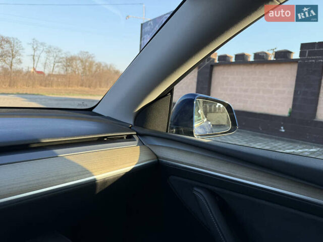 Синий Тесла Model Y, объемом двигателя 0 л и пробегом 27 тыс. км за 28100 $, фото 27 на Automoto.ua