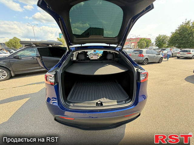 Синий Тесла Model Y, объемом двигателя 0 л и пробегом 26 тыс. км за 30000 $, фото 3 на Automoto.ua