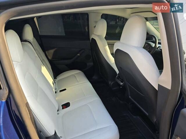 Синий Тесла Model Y, объемом двигателя 0 л и пробегом 51 тыс. км за 26400 $, фото 9 на Automoto.ua