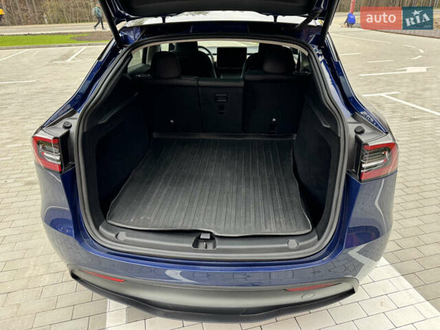 Синий Тесла Model Y, объемом двигателя 0 л и пробегом 18 тыс. км за 31200 $, фото 22 на Automoto.ua
