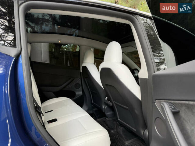 Синий Тесла Model Y, объемом двигателя 0 л и пробегом 11 тыс. км за 27999 $, фото 30 на Automoto.ua