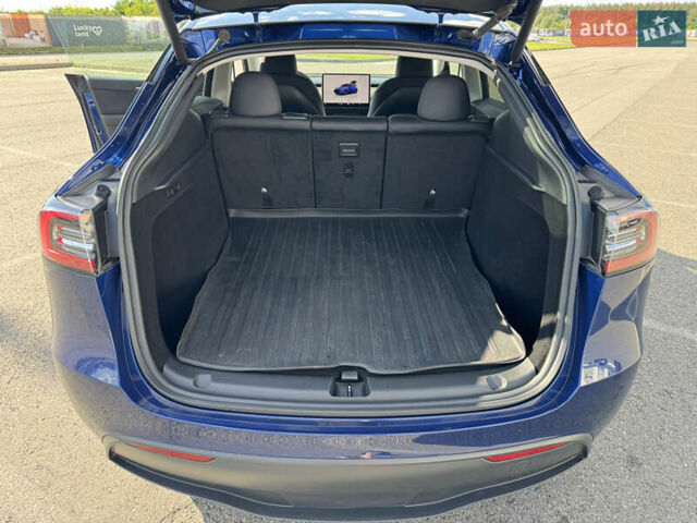 Синий Тесла Model Y, объемом двигателя 0 л и пробегом 17 тыс. км за 32500 $, фото 16 на Automoto.ua