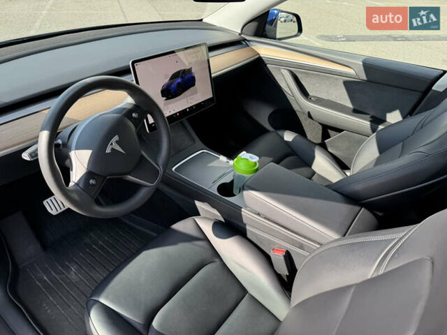 Синий Тесла Model Y, объемом двигателя 0 л и пробегом 17 тыс. км за 32500 $, фото 21 на Automoto.ua