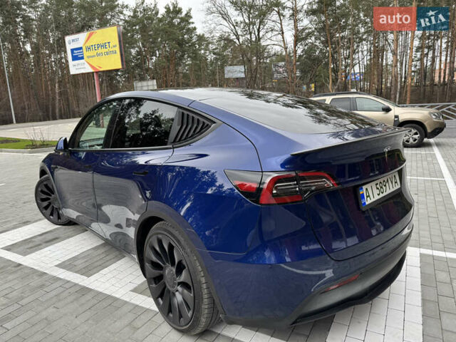 Синий Тесла Model Y, объемом двигателя 0 л и пробегом 18 тыс. км за 31200 $, фото 11 на Automoto.ua