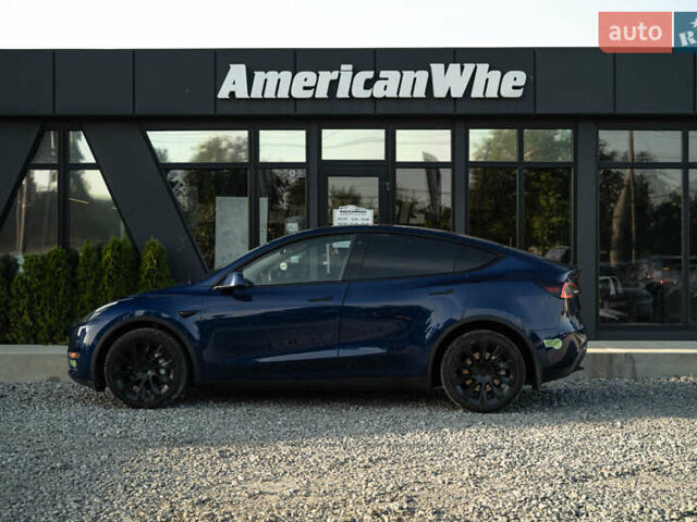 Синий Тесла Model Y, объемом двигателя 0 л и пробегом 79 тыс. км за 31900 $, фото 3 на Automoto.ua