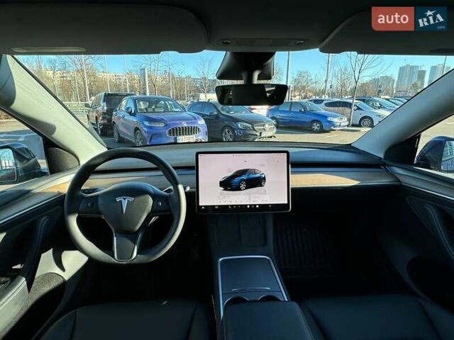 Синий Тесла Model Y, объемом двигателя 0 л и пробегом 48 тыс. км за 32990 $, фото 13 на Automoto.ua