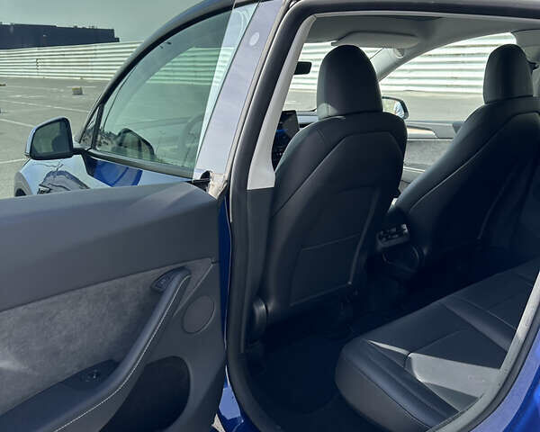 Синий Тесла Model Y, объемом двигателя 0 л и пробегом 7 тыс. км за 32000 $, фото 11 на Automoto.ua