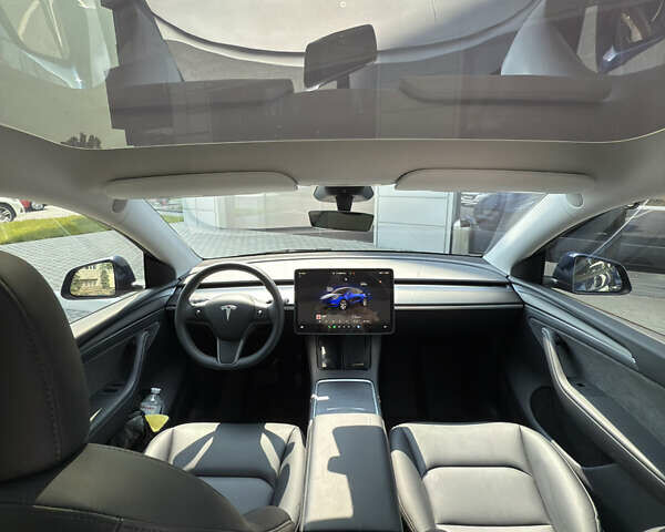 Синий Тесла Model Y, объемом двигателя 0 л и пробегом 12 тыс. км за 29000 $, фото 19 на Automoto.ua
