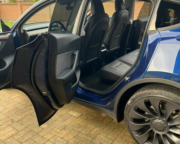Синий Тесла Model Y, объемом двигателя 0 л и пробегом 32 тыс. км за 32800 $, фото 11 на Automoto.ua
