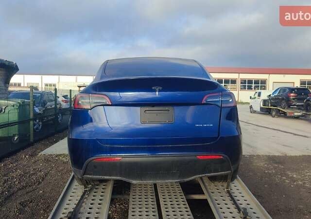 Синий Тесла Model Y, объемом двигателя 0 л и пробегом 41 тыс. км за 16000 $, фото 2 на Automoto.ua