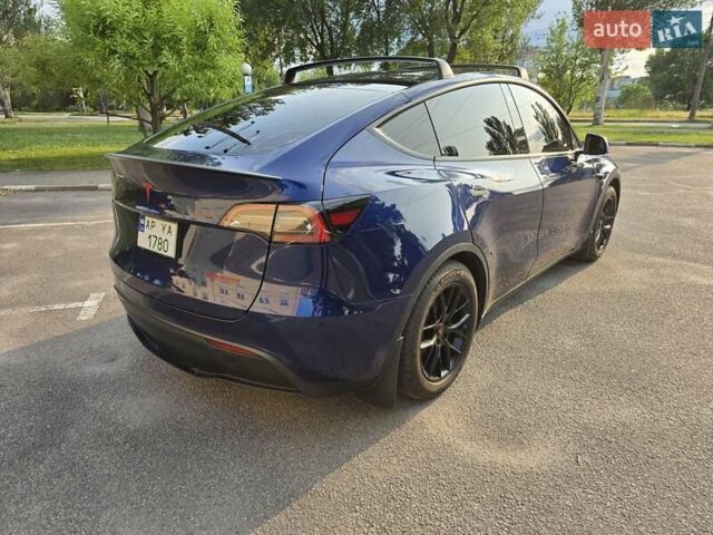 Синий Тесла Model Y, объемом двигателя 0 л и пробегом 51 тыс. км за 26400 $, фото 4 на Automoto.ua