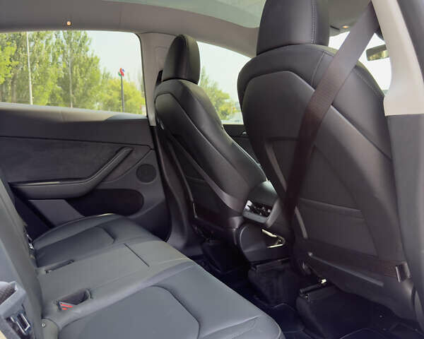 Синий Тесла Model Y, объемом двигателя 0 л и пробегом 12 тыс. км за 29000 $, фото 13 на Automoto.ua