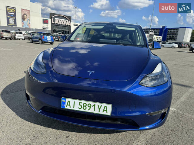 Синий Тесла Model Y, объемом двигателя 0 л и пробегом 17 тыс. км за 32500 $, фото 12 на Automoto.ua