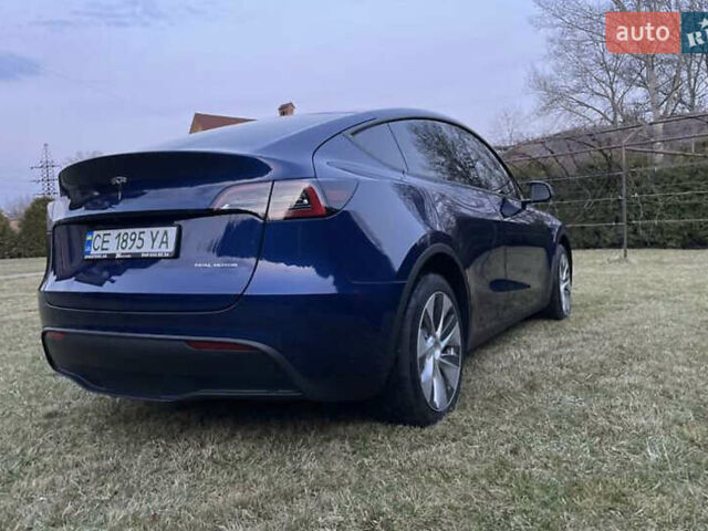 Синий Тесла Model Y, объемом двигателя 0 л и пробегом 51 тыс. км за 28500 $, фото 5 на Automoto.ua
