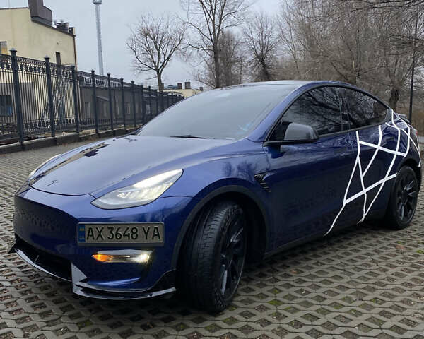 Синий Тесла Model Y, объемом двигателя 0 л и пробегом 42 тыс. км за 26900 $, фото 1 на Automoto.ua