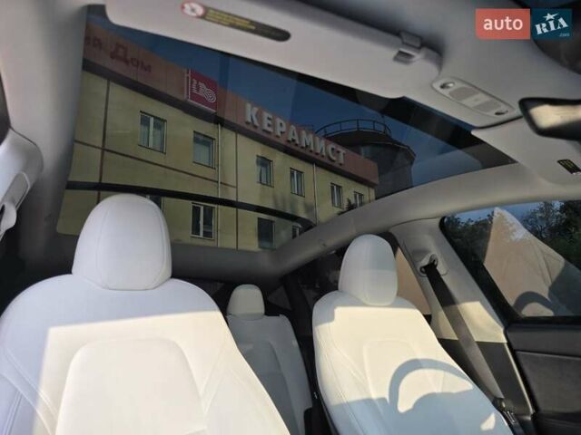 Синий Тесла Model Y, объемом двигателя 0 л и пробегом 51 тыс. км за 26400 $, фото 8 на Automoto.ua