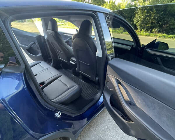 Синий Тесла Model Y, объемом двигателя 0 л и пробегом 55 тыс. км за 30500 $, фото 11 на Automoto.ua