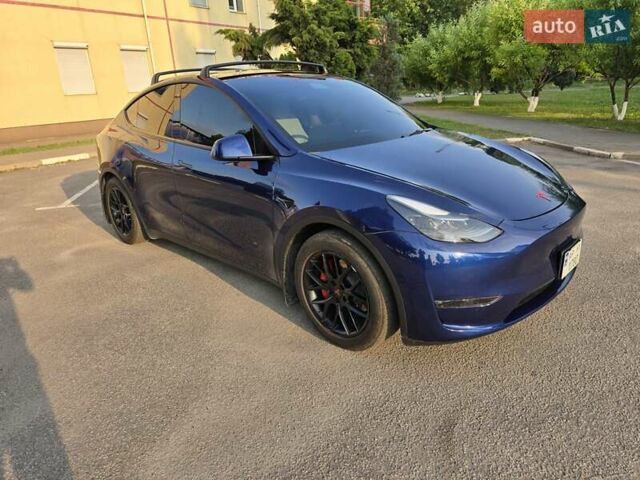 Синий Тесла Model Y, объемом двигателя 0 л и пробегом 51 тыс. км за 26400 $, фото 5 на Automoto.ua