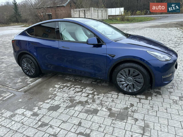 Синий Тесла Model Y, объемом двигателя 0 л и пробегом 47 тыс. км за 32000 $, фото 1 на Automoto.ua