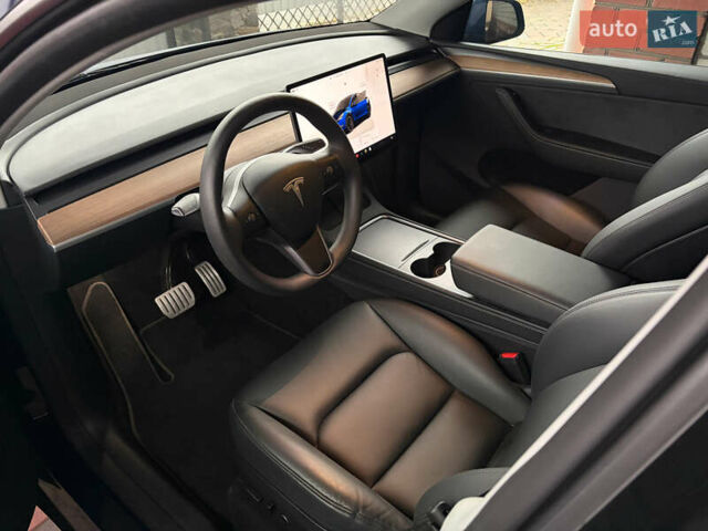 Синий Тесла Model Y, объемом двигателя 0 л и пробегом 19 тыс. км за 33900 $, фото 12 на Automoto.ua