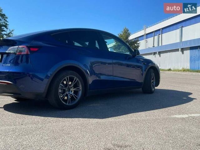 Синий Тесла Model Y, объемом двигателя 0 л и пробегом 28 тыс. км за 27800 $, фото 1 на Automoto.ua