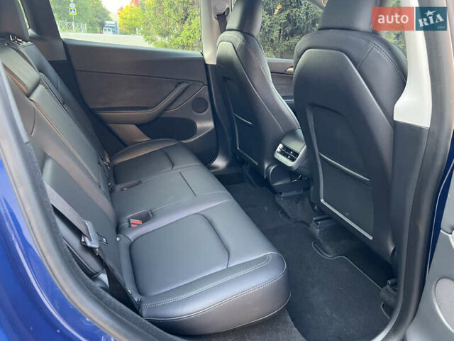 Синий Тесла Model Y, объемом двигателя 0 л и пробегом 13 тыс. км за 29500 $, фото 39 на Automoto.ua