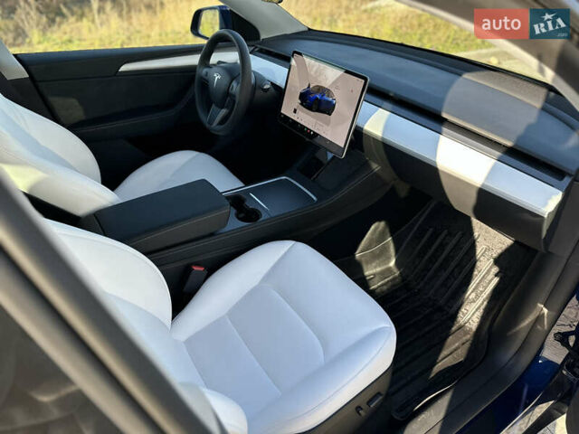 Синий Тесла Model Y, объемом двигателя 0 л и пробегом 10 тыс. км за 32500 $, фото 13 на Automoto.ua