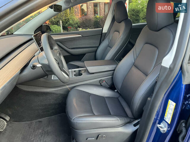 Синий Тесла Model Y, объемом двигателя 0 л и пробегом 13 тыс. км за 29500 $, фото 25 на Automoto.ua