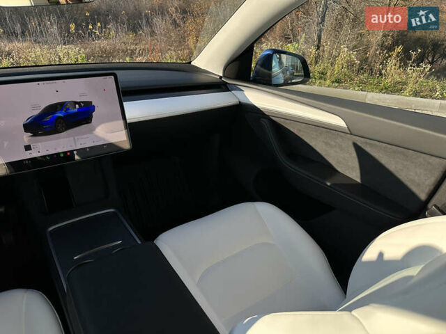 Синий Тесла Model Y, объемом двигателя 0 л и пробегом 10 тыс. км за 32500 $, фото 43 на Automoto.ua