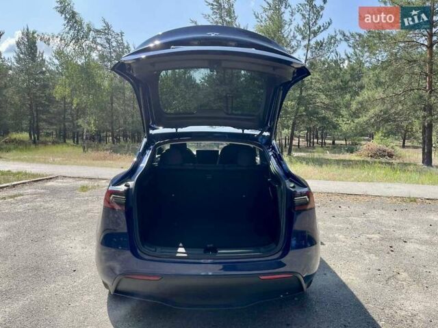 Синий Тесла Model Y, объемом двигателя 0 л и пробегом 18 тыс. км за 33500 $, фото 20 на Automoto.ua