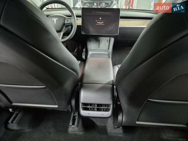 Синий Тесла Model Y, объемом двигателя 0 л и пробегом 44 тыс. км за 25000 $, фото 12 на Automoto.ua