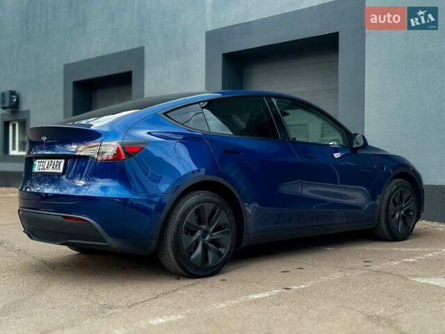 Синий Тесла Model Y, объемом двигателя 0 л и пробегом 12 тыс. км за 33999 $, фото 5 на Automoto.ua