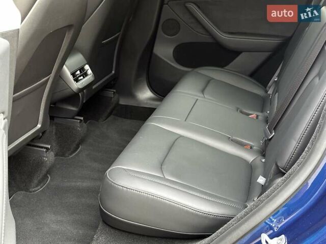 Синий Тесла Model Y, объемом двигателя 0 л и пробегом 12 тыс. км за 33999 $, фото 11 на Automoto.ua